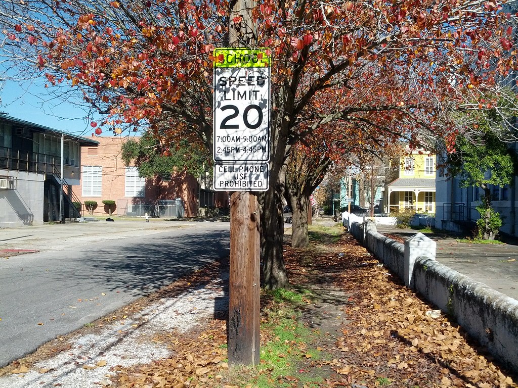 School zone speed limit signs also prohibit cell phone use