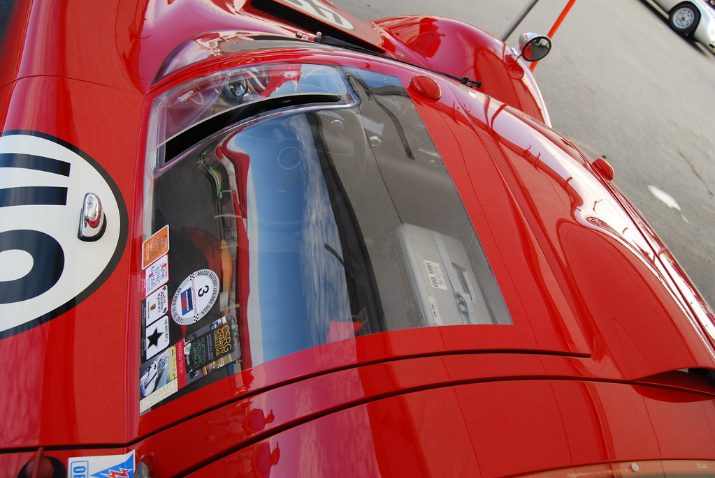 red Porsche 906 #48, driver's door, inspection stickers, vents, cockpit