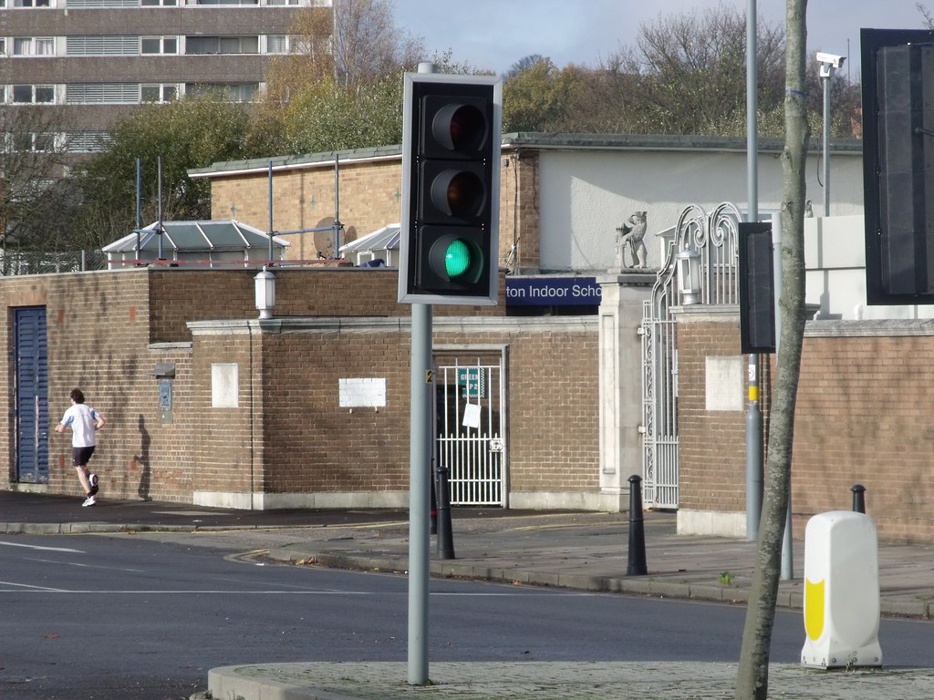 Jogging man - Edgbaston Cricket Ground - Warwickshire County Cricket Club - stand from Edgbaston Road now demo